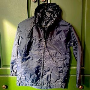 Lands’ End size 8 navy zip up rain jacket. Lightweight.